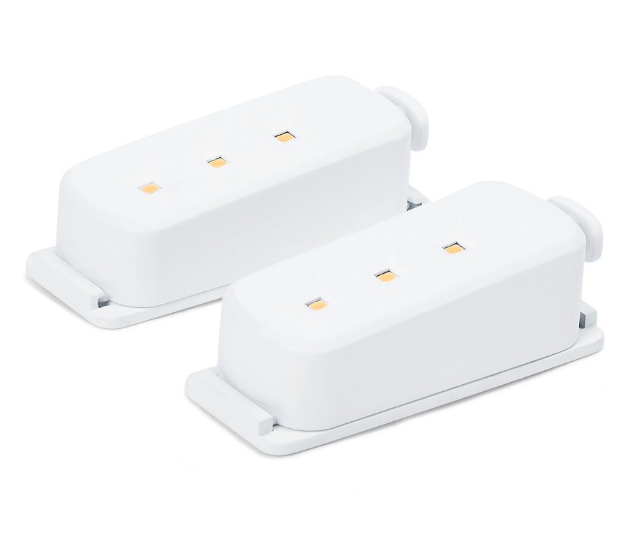 Dva biele elektronické moduly s LED diódami na bielom pozadí.