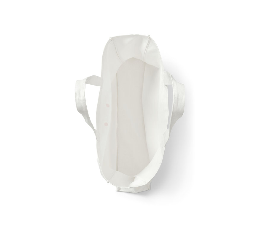 Pohľad zhora na prázdnu bielu plátennú nákupnú tašku.