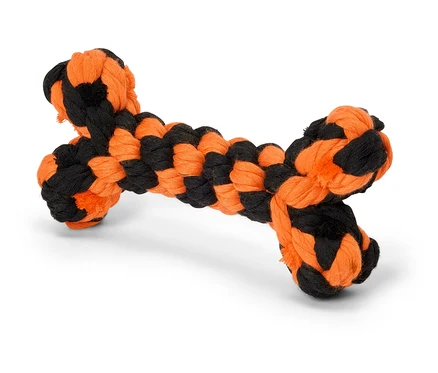 Čierno-oranžová hračka pre psov v tvare kosti.