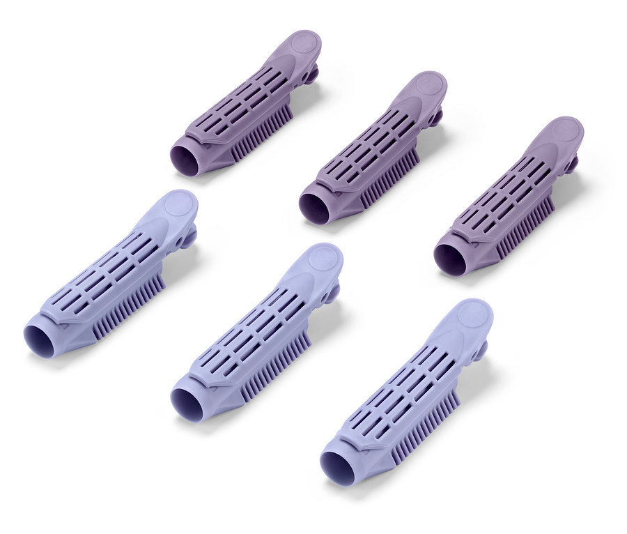 Šesť fialových natáčok na vlasy na bielom pozadí.