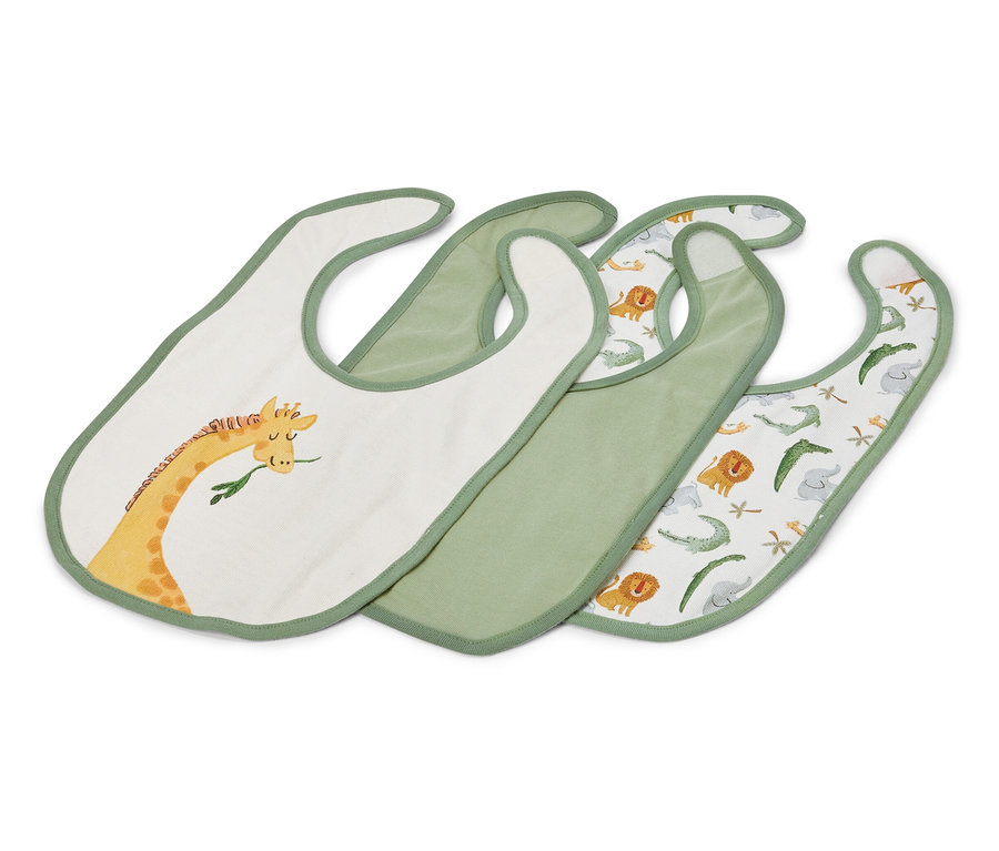 Tri zelené detské podbradníky, jeden s motívom žirafy, jeden jednofarebný zelený a jeden so zvieracími motívmi.