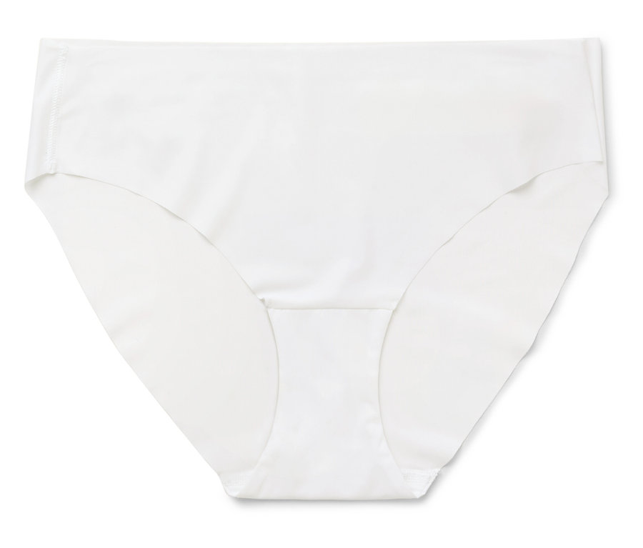 Biela dámska spodná bielizeň leží na bielom pozadí.