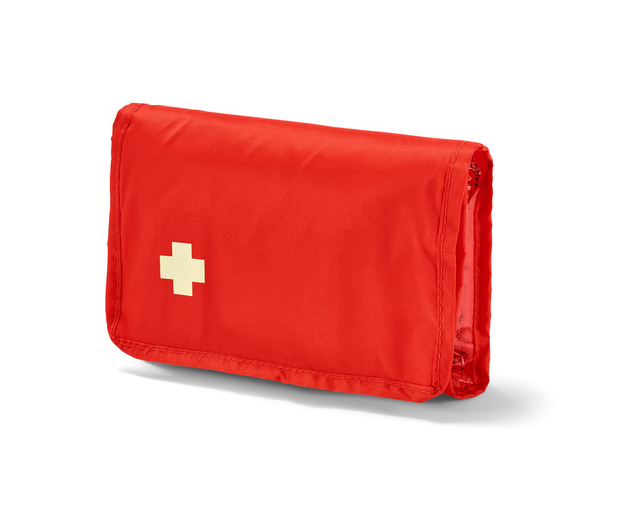 Červená lekárnička na bicykel s bielym krížom.