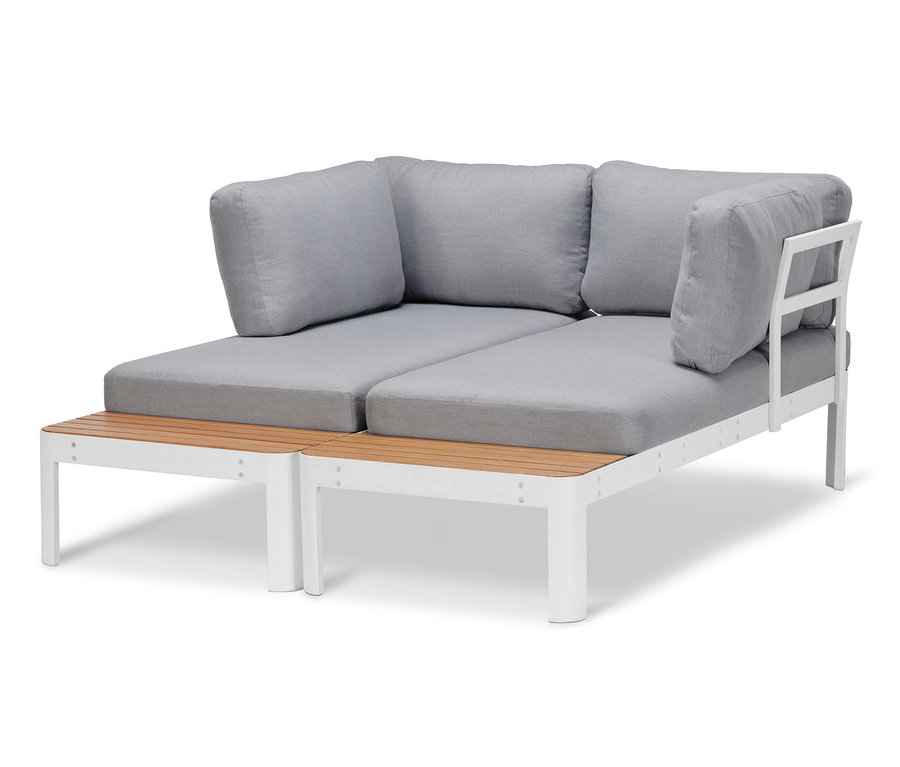 Rohová sedacia súprava a konferenčný stolík s nastaviteľnou výškou majú sivé vankúše a biely rám.