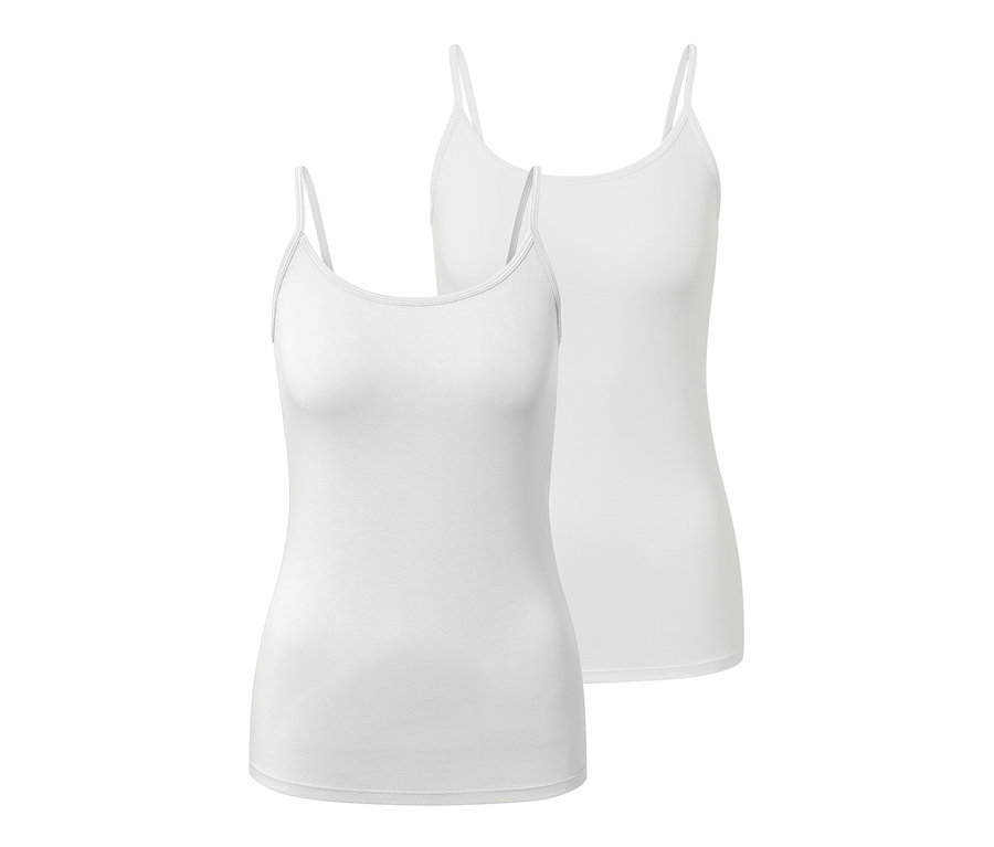 Dve biele tielka s tenkými ramienkami.