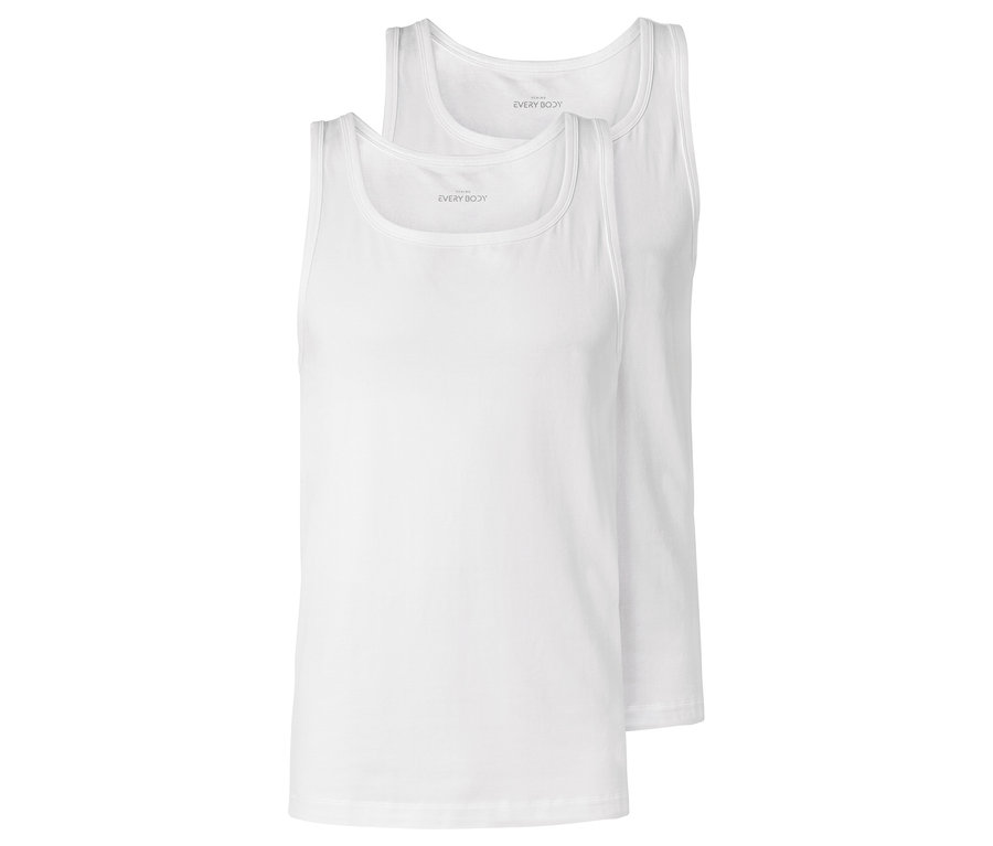 Dve biele tielka ležia na sebe.