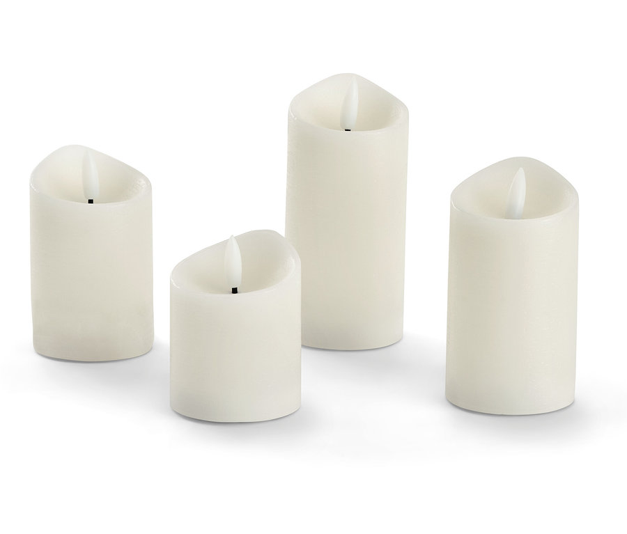 Štyri krémové LED sviečky z pravého vosku.