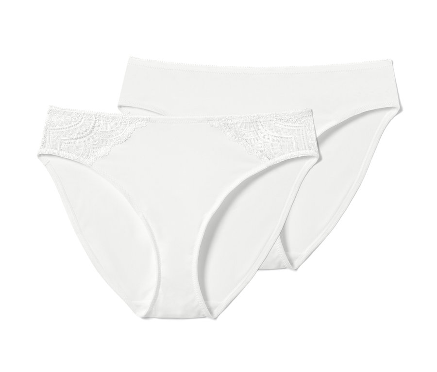 Dvoje biele nohavičky, 2 ks, ležia na sebe.