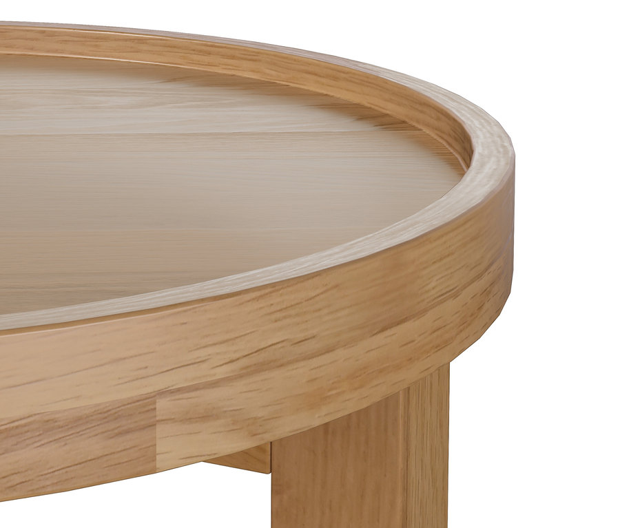 Detail okrúhleho stolíka z bledého dreva.