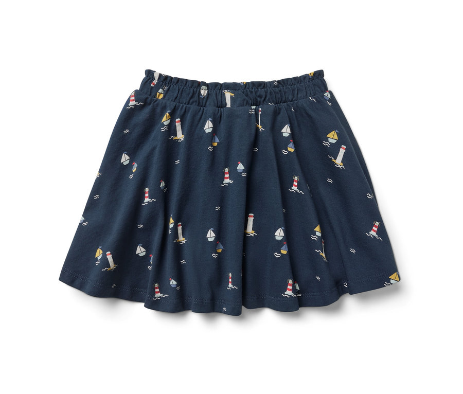 Tmavomodrá dievčenská džersejová sukňa s námorníckym vzorom majákov a lodí.