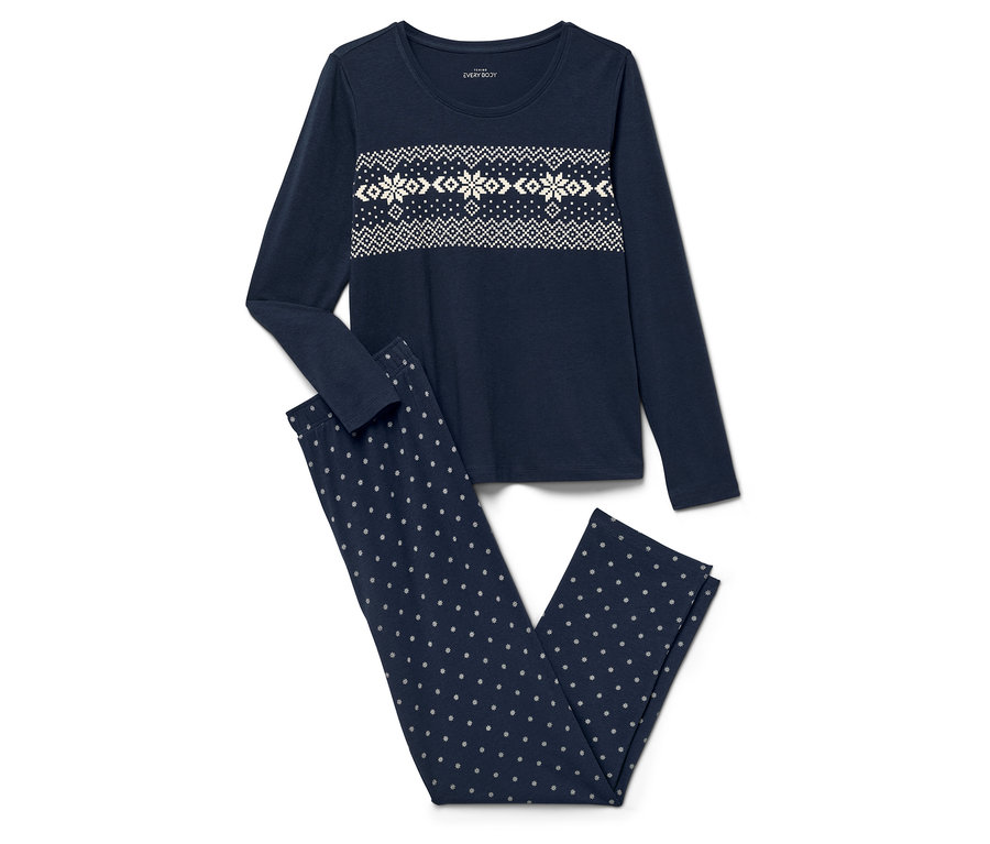 Tmavomodré pyžamo s dlhým rukávom a vzorom snehových vločiek a nohavicami s bodkami.