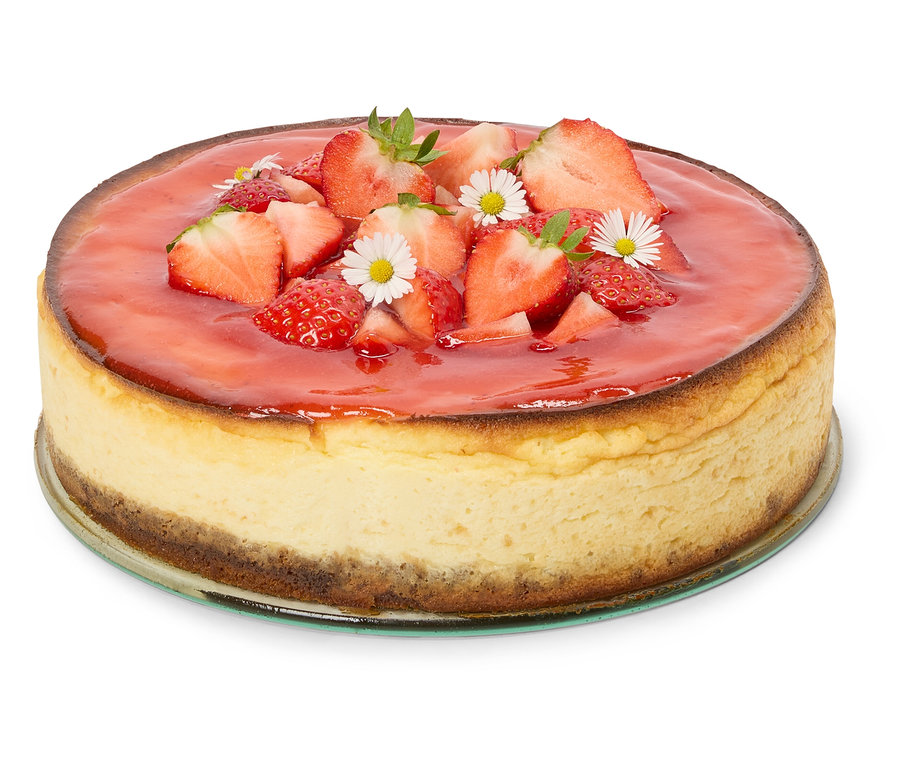 Jahodový cheesecake s jahodami a margarétkami.