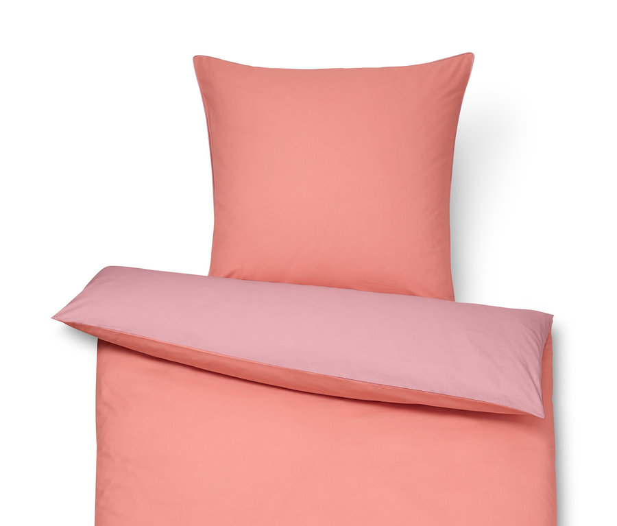 Ružové prémiové bavlnené posteľné obliečky štandardnej a nadmernej veľkosti.