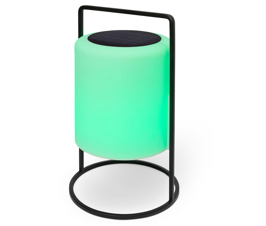 Zelená lampa s čiernym reproduktorom navrchu a čiernym kovovým rámom.