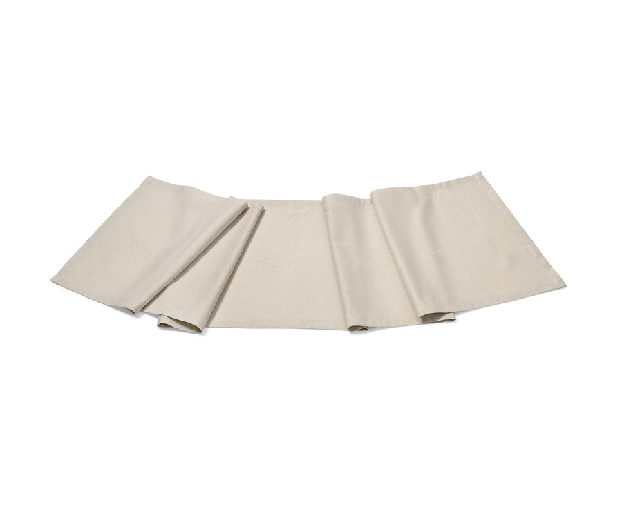 Krémový žakárový behúň na stôl leží na bielom pozadí.