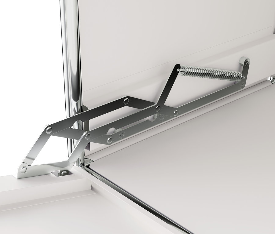 Detail mechanizmu kovovej komody »CN3« s výklopnými dvierkami.