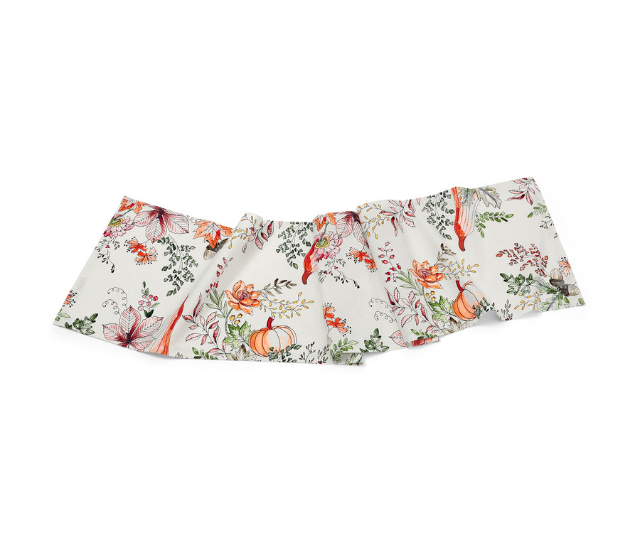 Behúň na stôl s jesenným motívom tekvíc a listov.