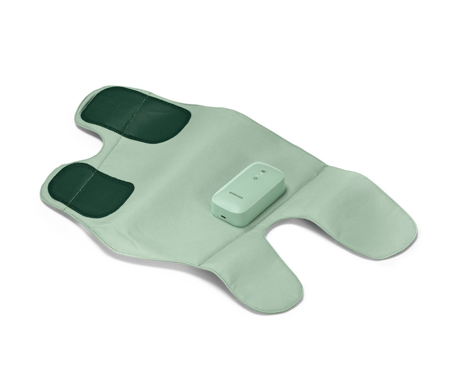 Rozložená akumulátorová masážna manžeta svetlozelenej farby s tmavozelenými aplikáciami a ovládacím prvkom v strede.