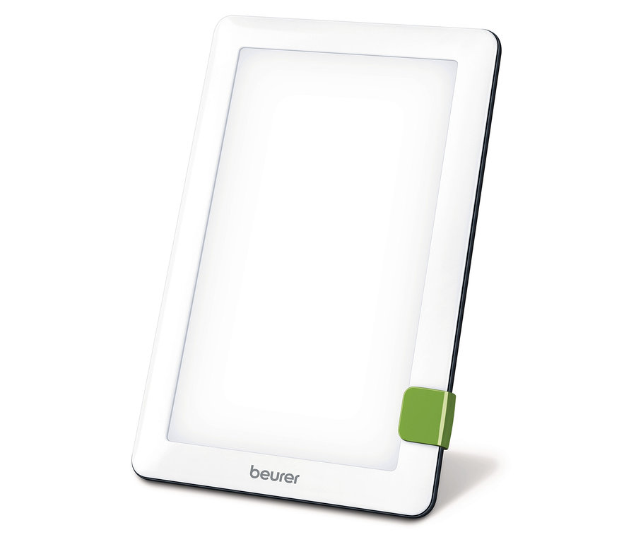 Svetelná lampa Beurer so zeleným stojanom na bielom pozadí.