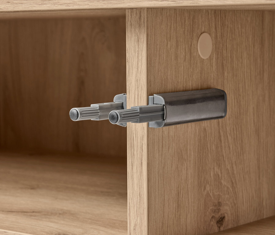 Detailný záber príborníka REET s detailom mechanizmu.