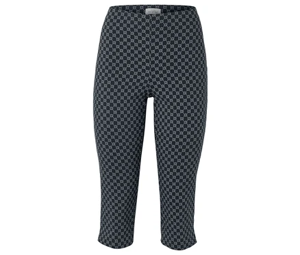 Námornícke modré capri nohavice s opakujúcim sa bielym geometrickým vzorom.
