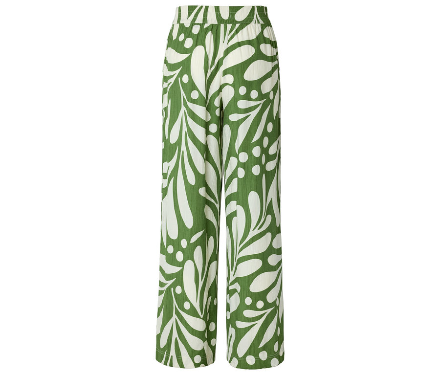 Zelené nohavice s bielym vzorom listov.