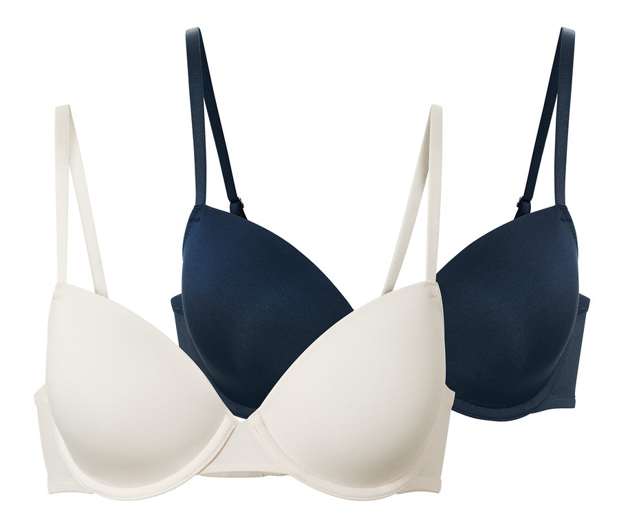 Dve podprsenky s košíčkami v krémovej a tmavomodrej farbe.