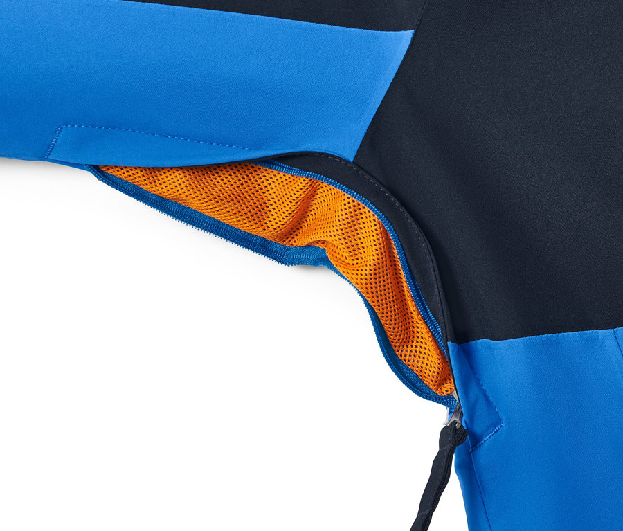 Detail modrej lyžiarskej bundy so zipsom a oranžovou podšívkou.