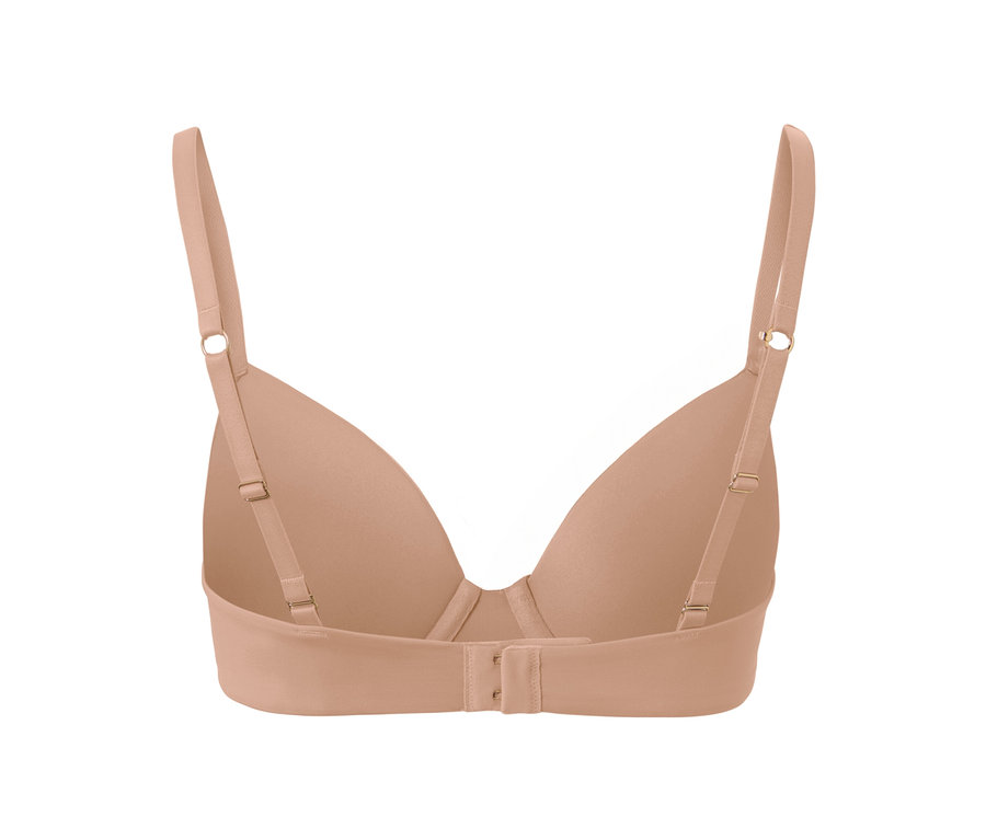 Detail pohľadu zozadu na telovú podprsenku pod tričko.