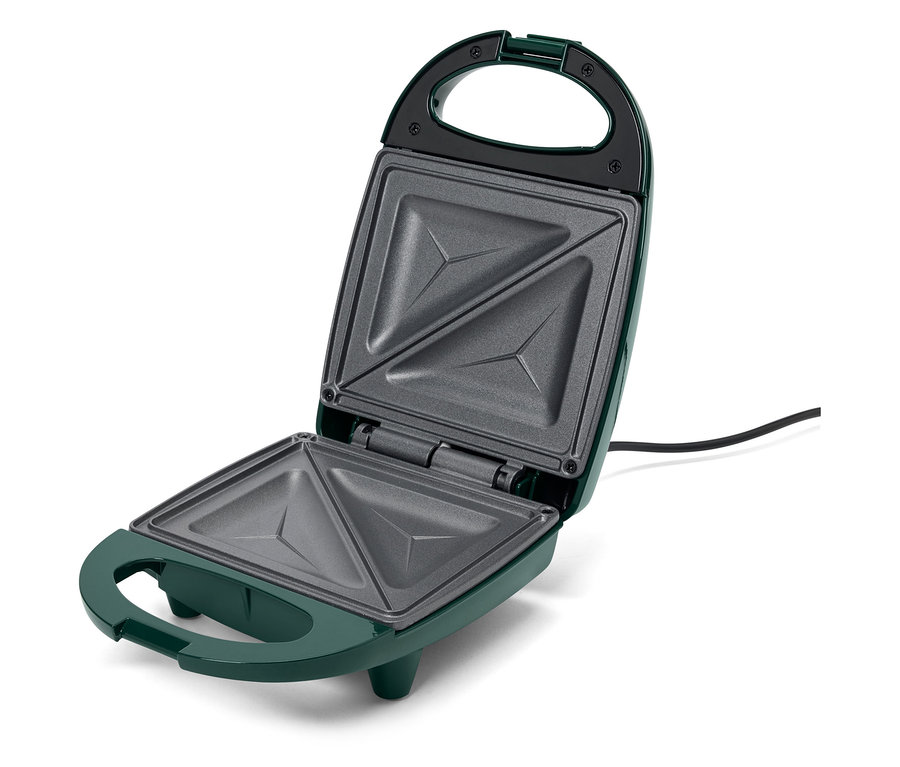 Otvorený zelený sendvičovač s trojuholníkovými priehlbinami.