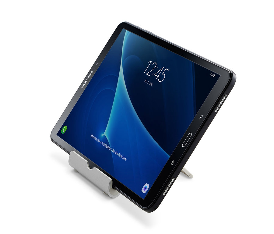 Čierny tablet je opretý o Stojan na smartfón alebo tablet.