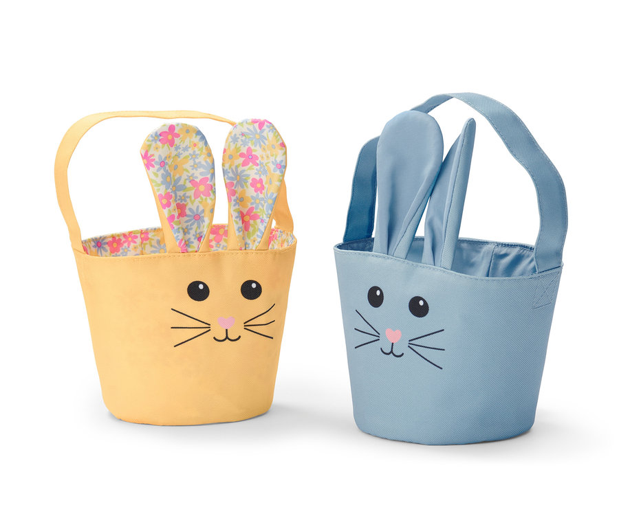 Dve taštičky na zber veľkonočných vajíčok: žltá s kvetinovými ušami a modrá s modrými ušami.