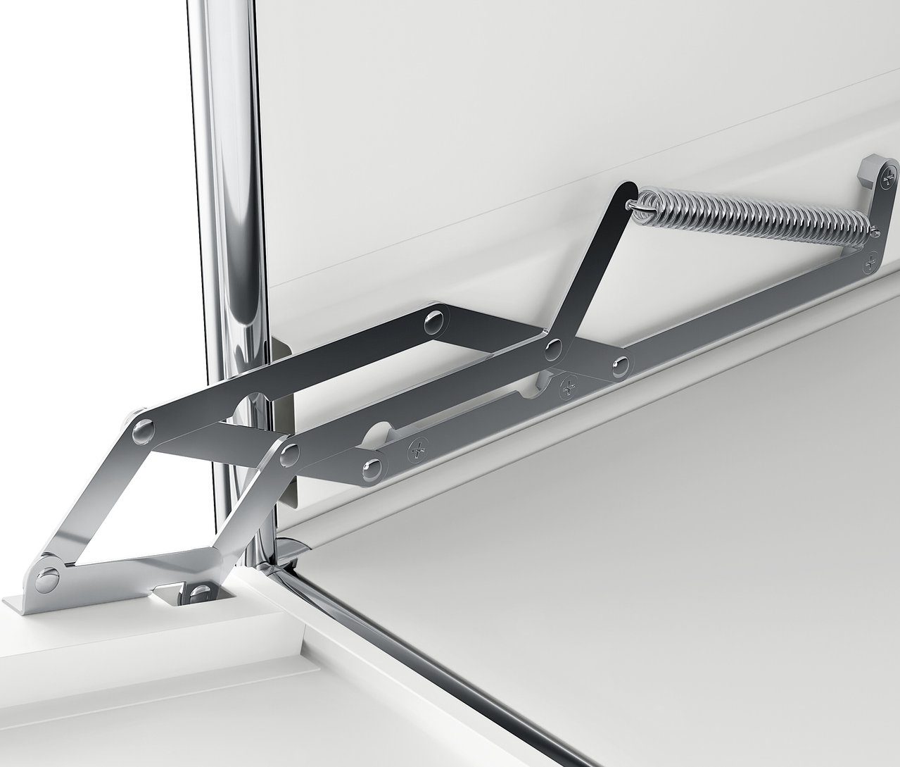 Detail strieborného skladacieho mechanizmu na bielom povrchu.