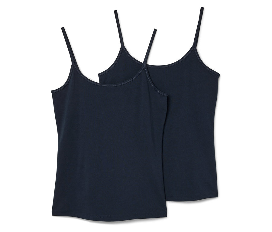 Dve tmavomodré tielka s tenkými ramienkami ležiace vedľa seba.