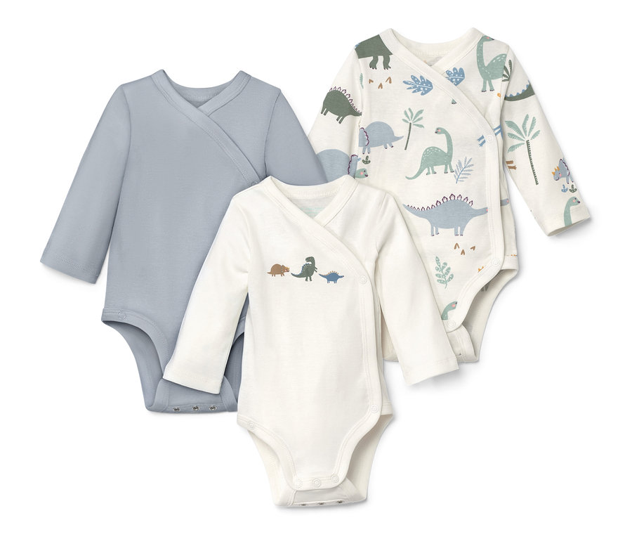 Tri body s dlhým rukávom, jedny modré, jedny s motívom dinosaura, jedny so vzormi dinosaurov a rastlín.
