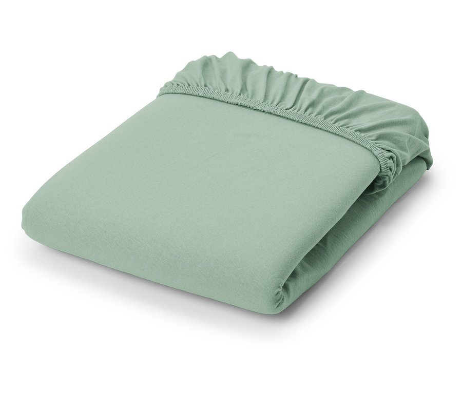 Zložená svetlozelená džersejová plachta.
