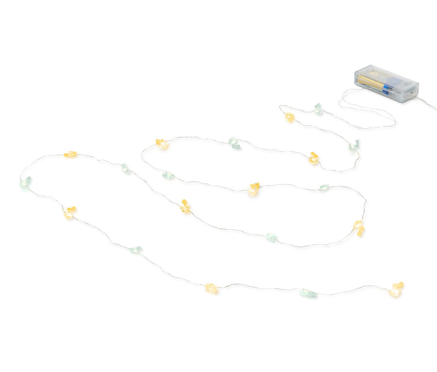 Svetelná reťaz s mikro LED a zajačikmi na bielom pozadí.