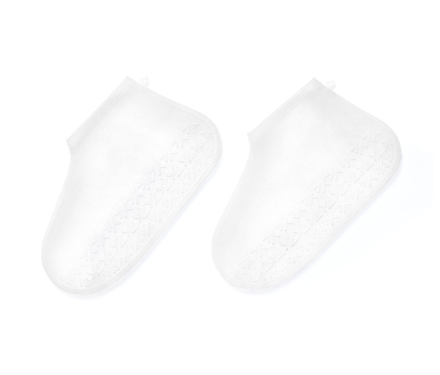 Dva nepremokavé návleky na topánky ležia vedľa seba.