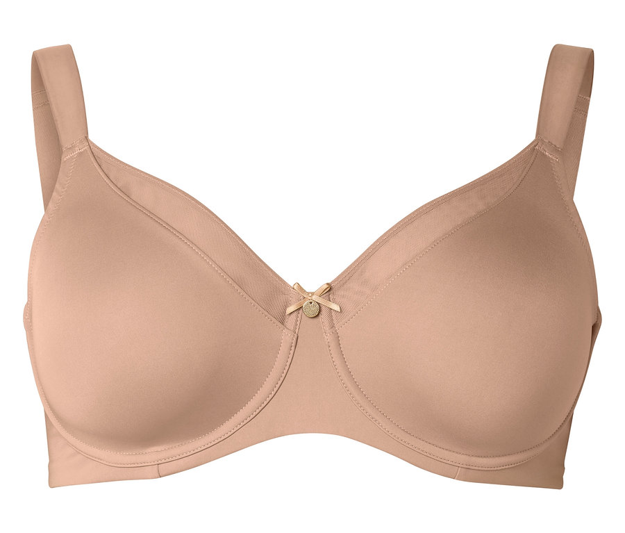 Detailný záber telovej podprsenky s kosticami a malým detailom mašle v strede.