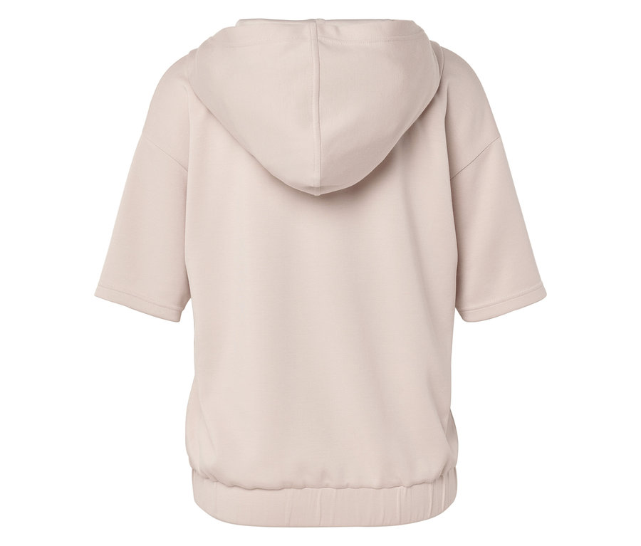 Pohľad zozadu na béžovú mikinu s kapucňou a krátkymi rukávmi.