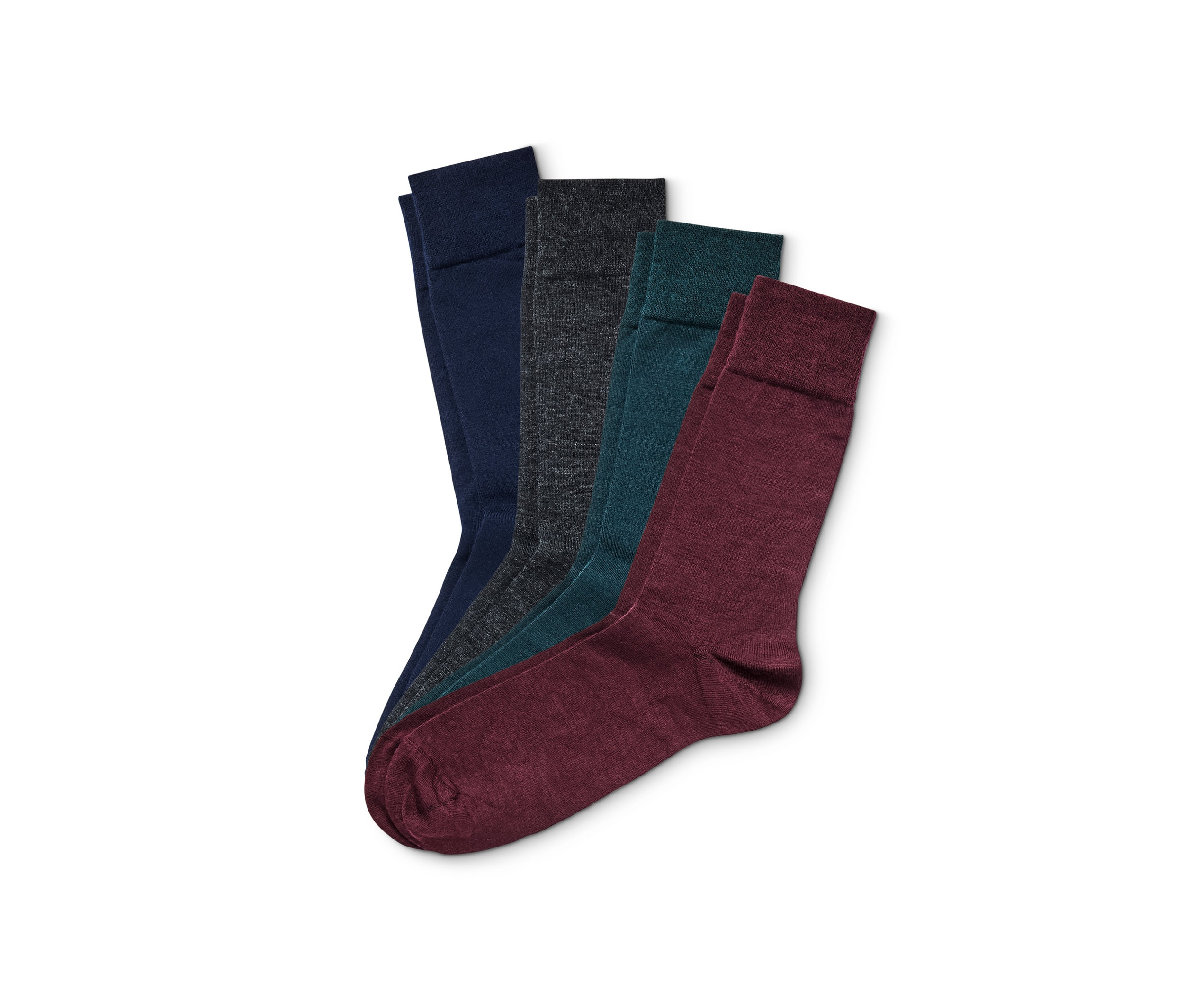 Štyri páry vlnených ponožiek merino rôznych farieb na bielom pozadí.