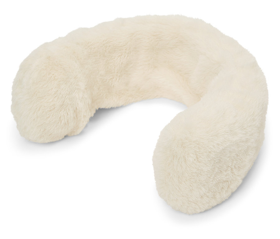 Krémový cestovný vankúš v tvare písmena U.