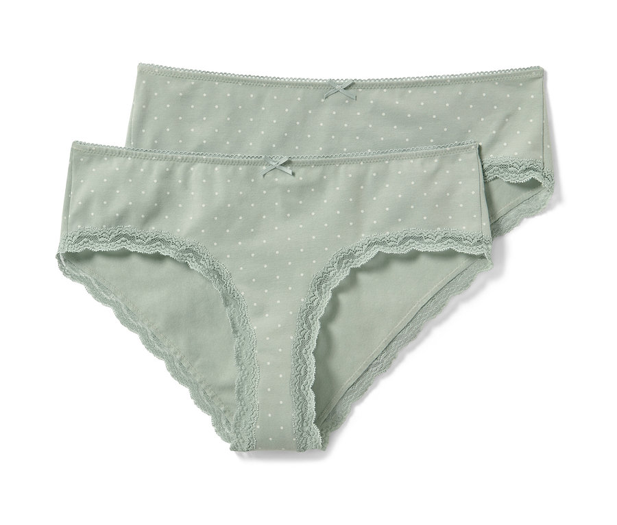 Dvoje svetlozelené bokové nohavičky s bielymi bodkami.