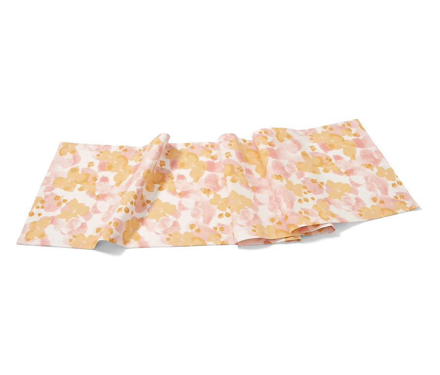 Behúň na stôl s kvetinovým vzorom v ružovej a žltej farbe.