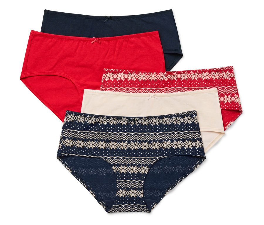 Pätica dámskych nohavičiek rôznych farieb a vzorov leží na sebe.