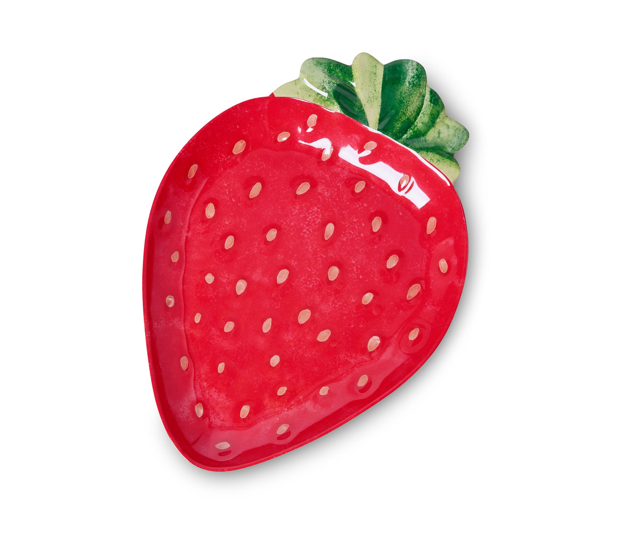 Červený servírovací tanier v tvare jahody s bielymi bodkami.