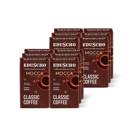 Balíčky mletej kávy Eduscho Mocca Grande usporiadané v niekoľkých radoch.