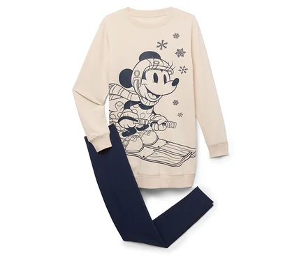 Béžová mikina s obrázkom Mickeyho Mousa na saniach a tmavomodré legíny.