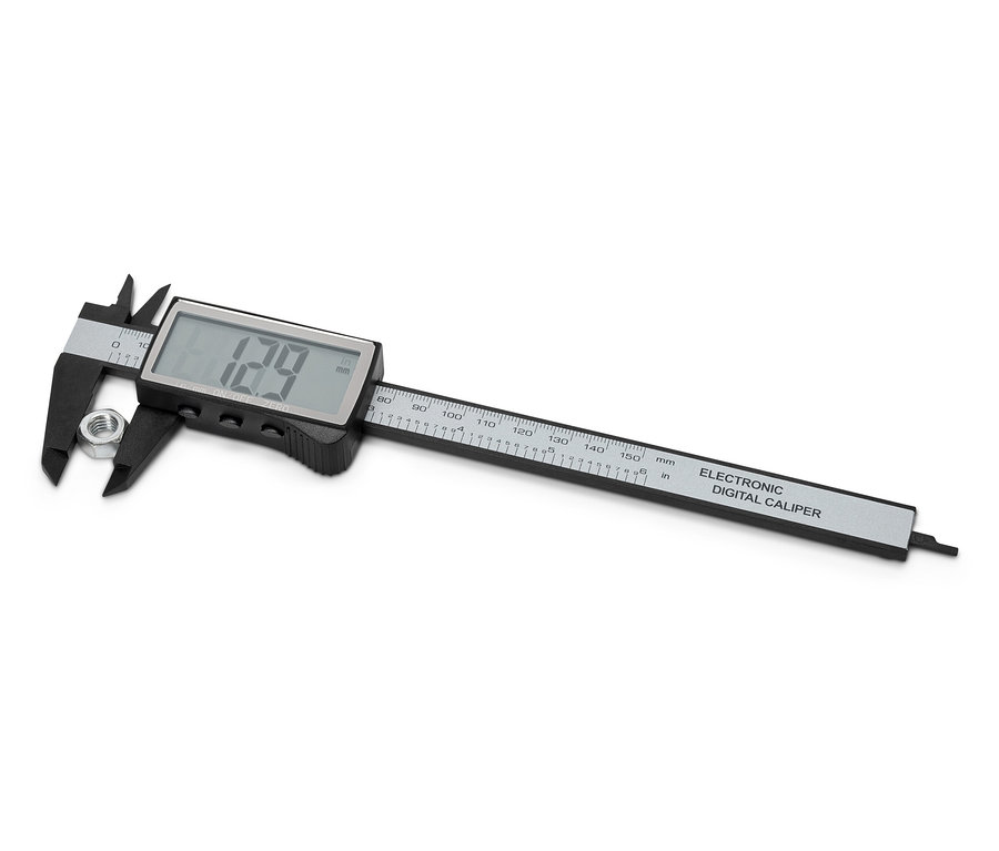 Digitálne posuvné meradlo meria maticu.