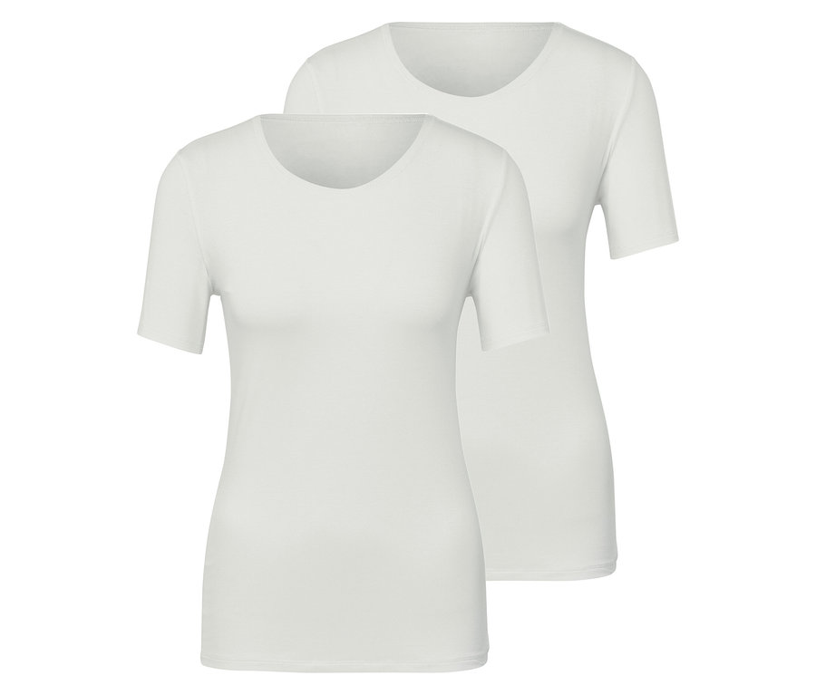 Dve biele tričká s krátkym rukávom.